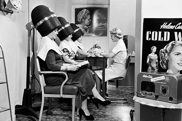 vintage photo women under hair dryers